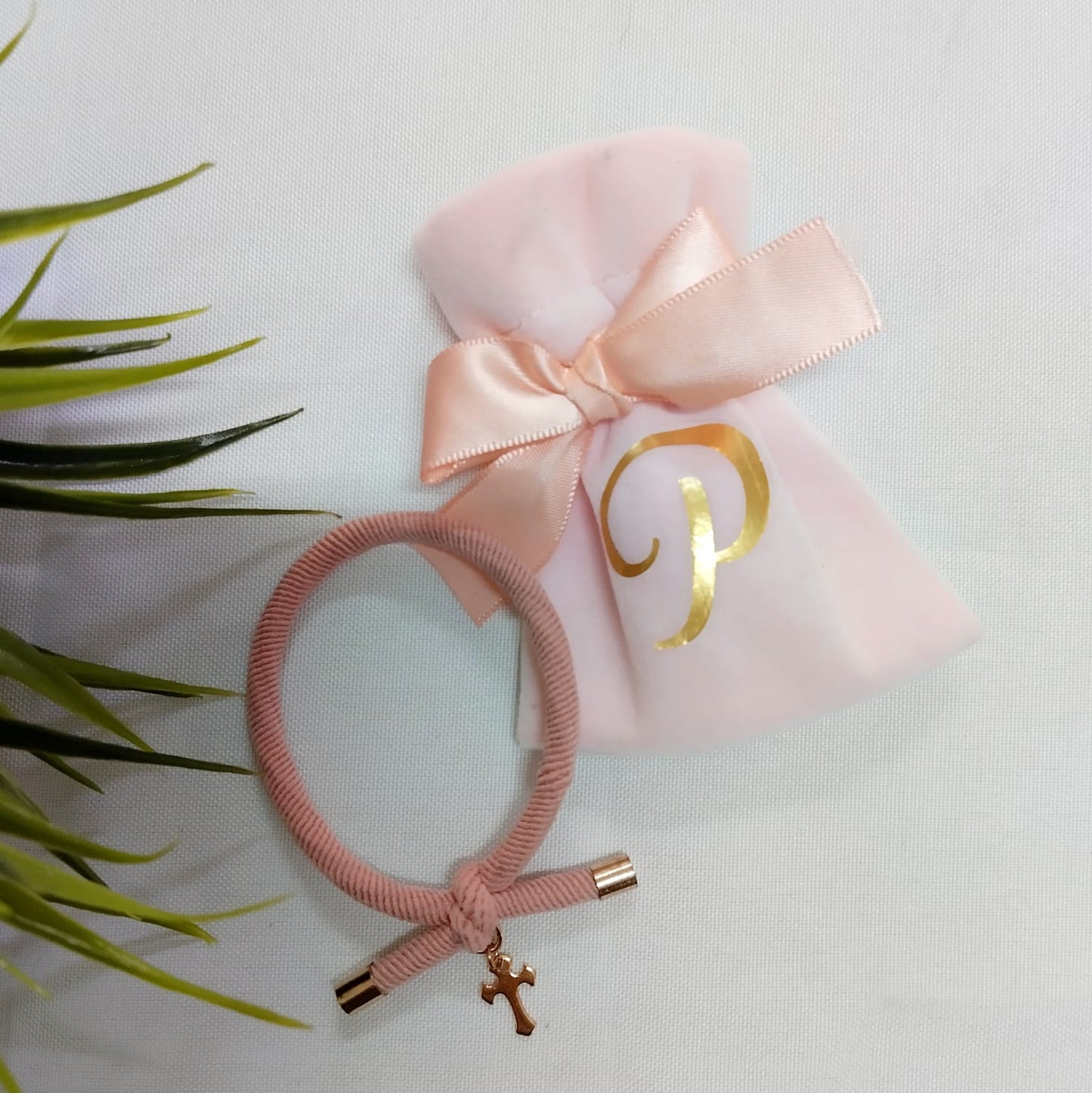 Pulsera elástica con bolsita inicial